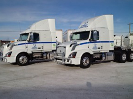 TANDEM AXLE SLEEPER CAB TRACTOR